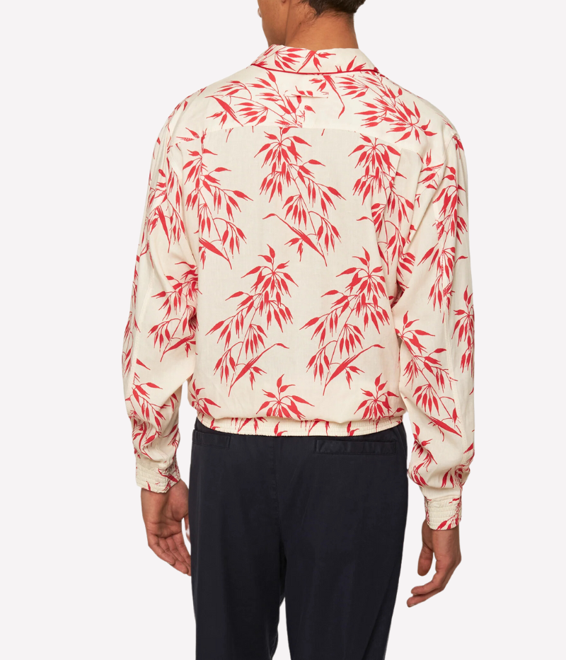Lakewood long-sleeve overhead shirt in printed linen with red bamboo design, featuring concealed placket, classic collar, pleated back yoke for ease of movement, and branded imitation mother of pearl buttons.