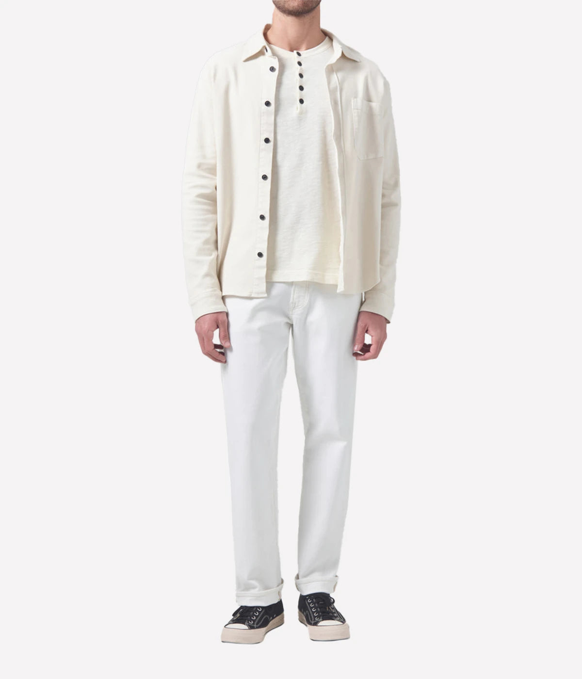 Citizens of Humanity London jeans in a crisp white wash, featuring a slim, tapered fit with a comfortable feel through the hip and thigh. Crafted from a soft organic cotton blend for a sleek yet flexible finish.