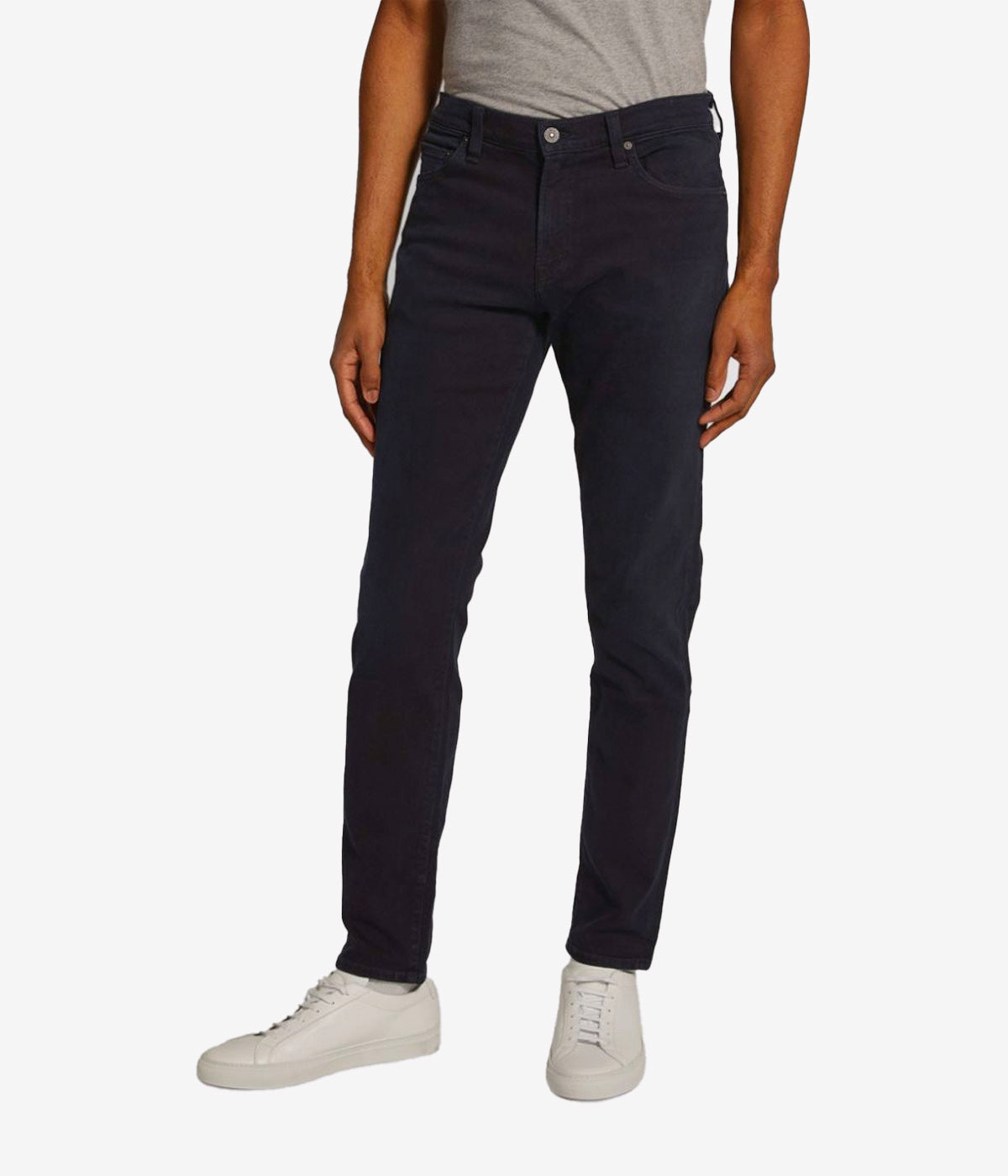 Slim-fit tapered jeans in dark wash, crafted with durable Perform denim fabric.