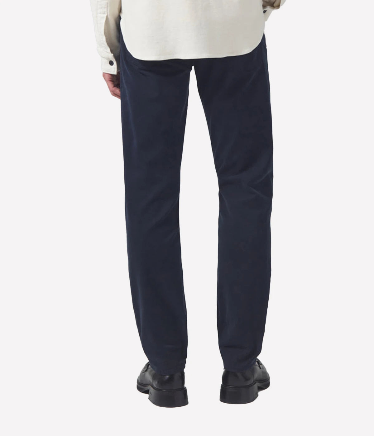 Back view of the jeans, featuring the signature Citizens of Humanity stitching on the pockets and sleek tapered leg.