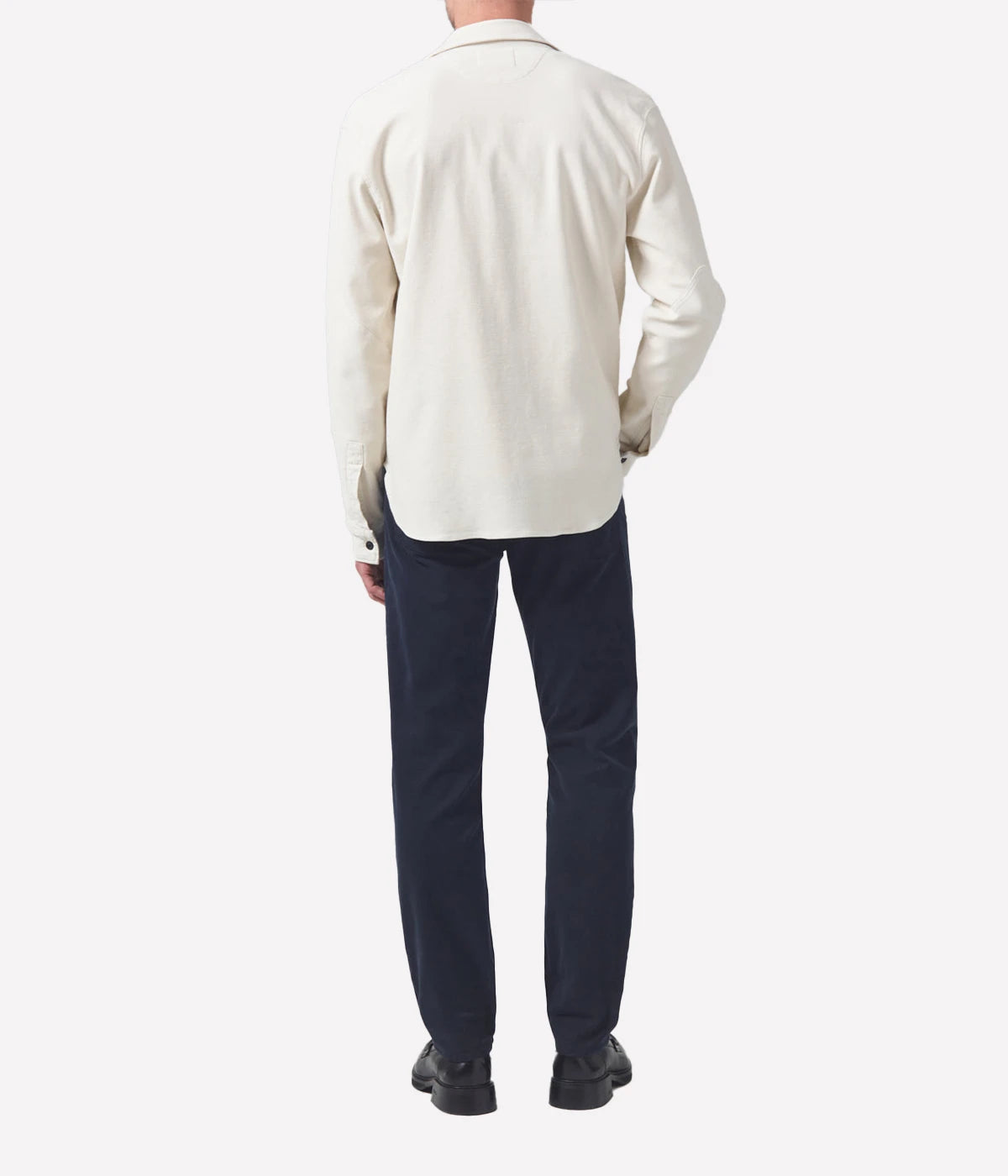 Back view of the jeans, featuring the signature Citizens of Humanity stitching on the pockets and sleek tapered leg.