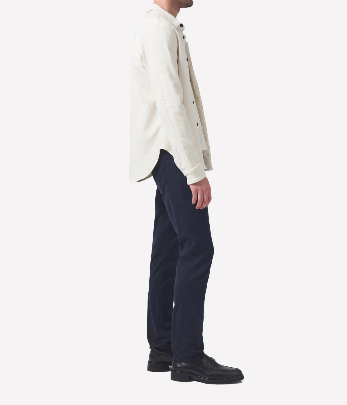 Side profile of the London Slim Taper jeans, showcasing the streamlined fit and durable Perform denim fabric.