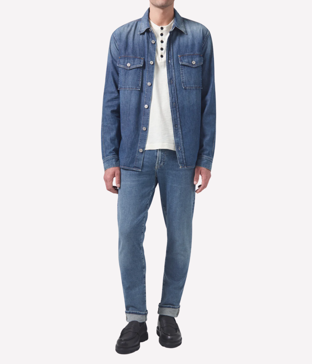 Citizens of Humanity London Jean in Parkland medium indigo wash with subtle fading and whiskering—lightweight stretch denim in a slim tapered fit.
