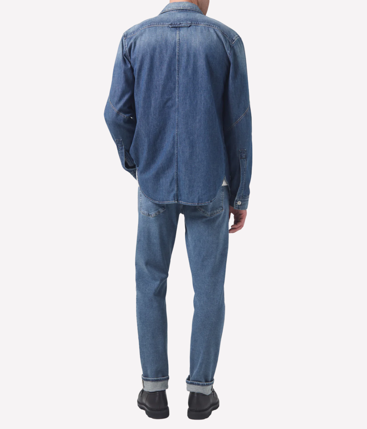 Citizens of Humanity London Jean in Parkland medium indigo wash with subtle fading and whiskering—lightweight stretch denim in a slim tapered fit.