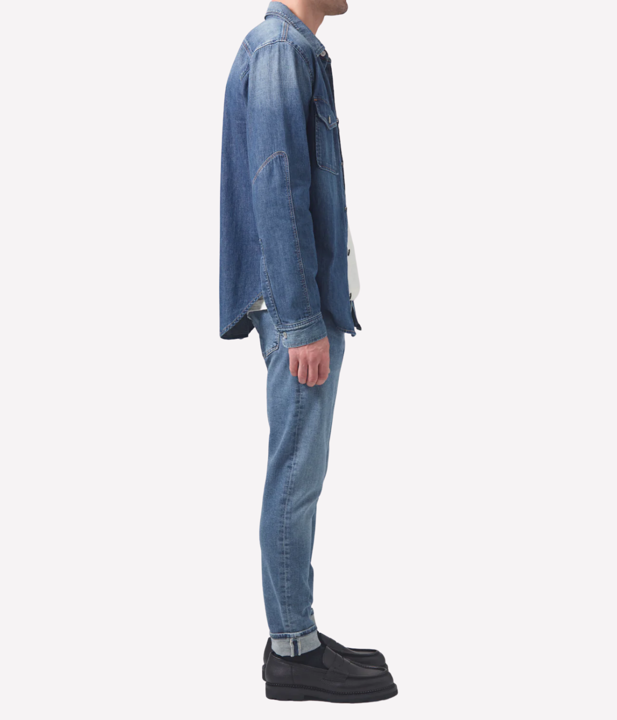 Citizens of Humanity London Jean in Parkland medium indigo wash with subtle fading and whiskering—lightweight stretch denim in a slim tapered fit.