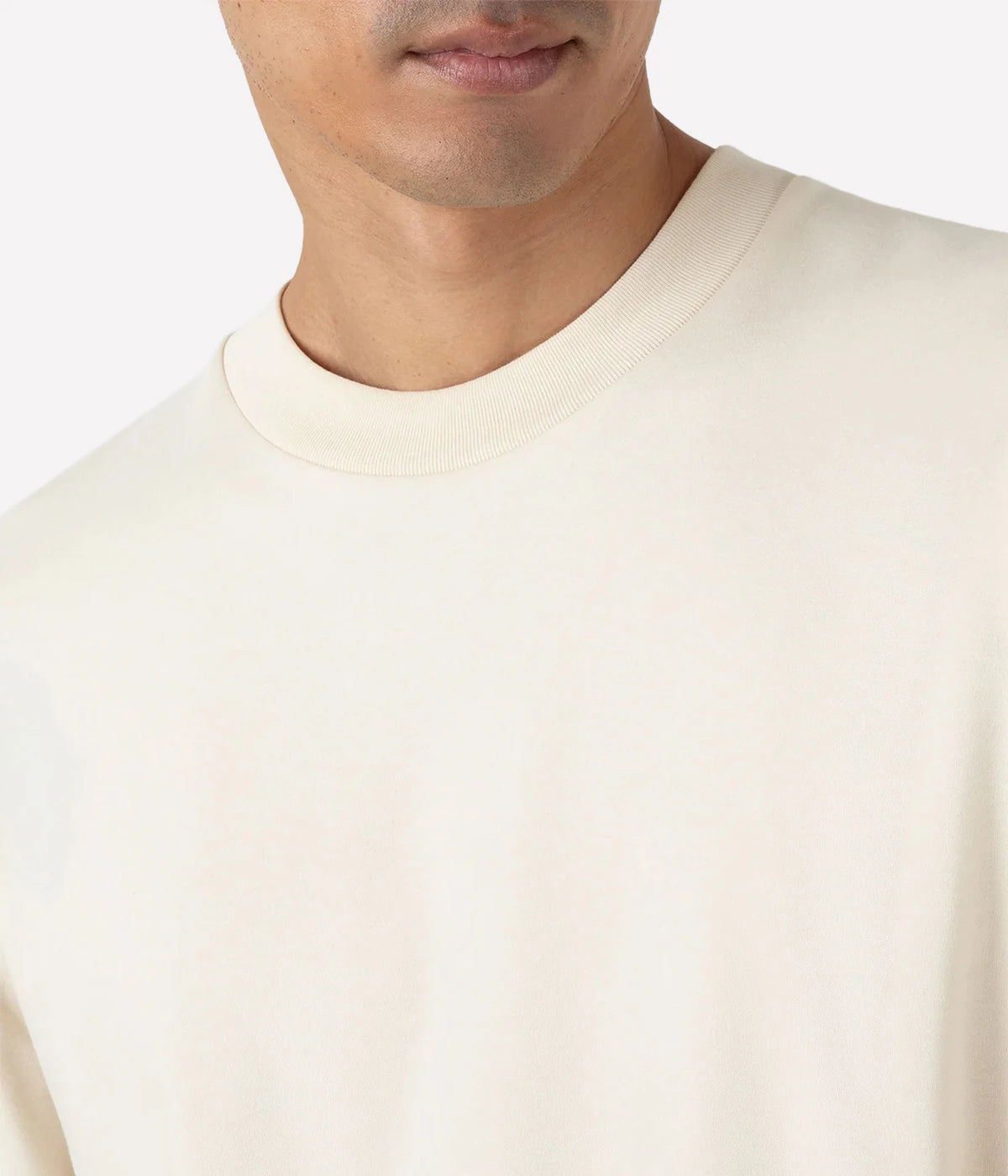 Undyed beige long sleeve shirt for men, made from carbon-brushed Supima cotton. Stylish and versatile winter shirt for layering in a natural, earthy tone.