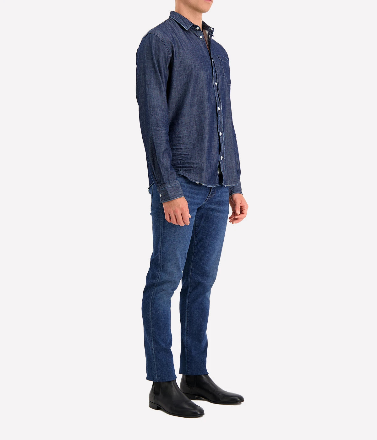 A side view of the Luke Woven Button Down Shirt, highlighting its structured silhouette and clean lines along the sleeves and hem.