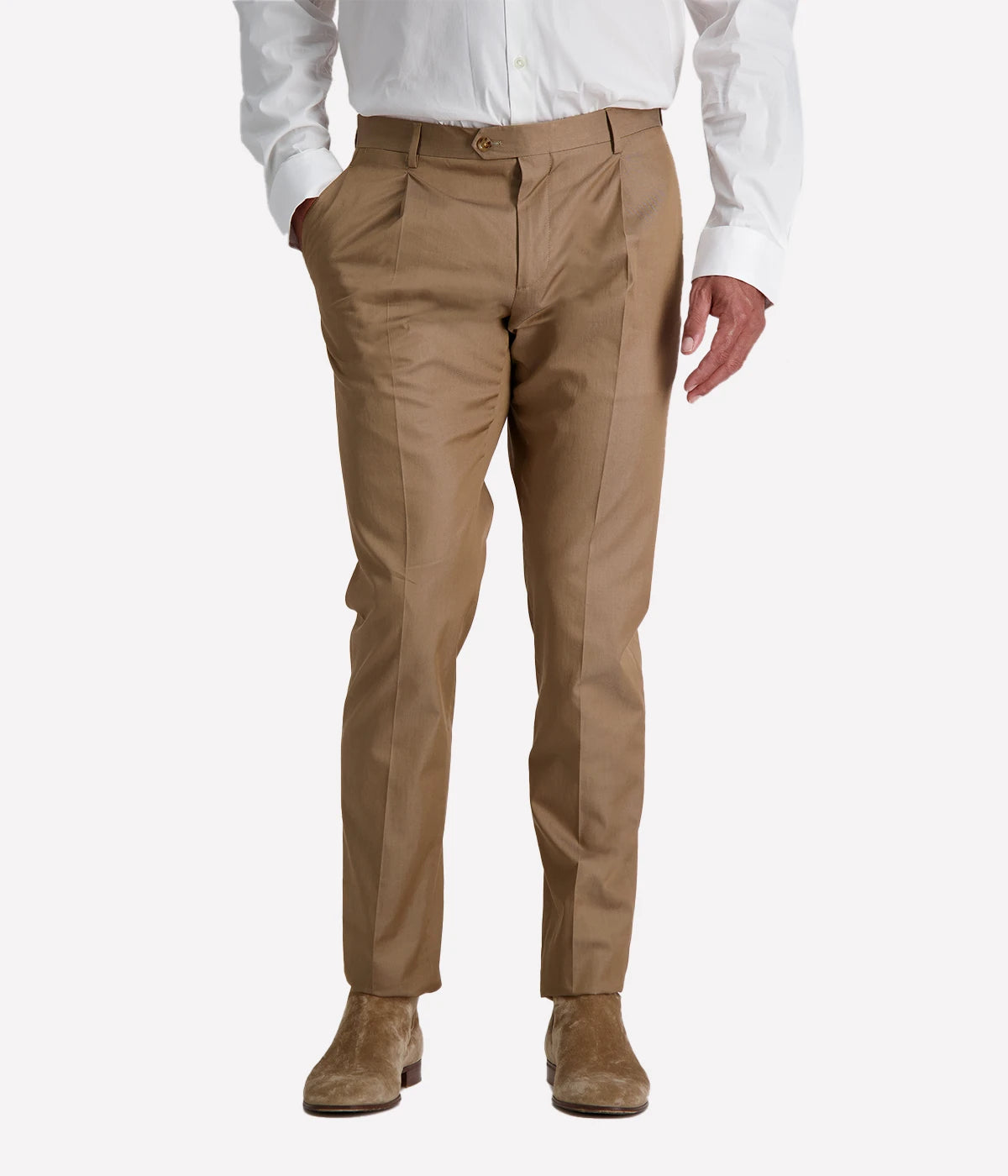 Model wearing a light brown Lardini cotton suit with a white shirt and suede loafers, featuring a single-breasted blazer with Lardini’s signature boutonnière, styled outdoors in a relaxed, modern setting.