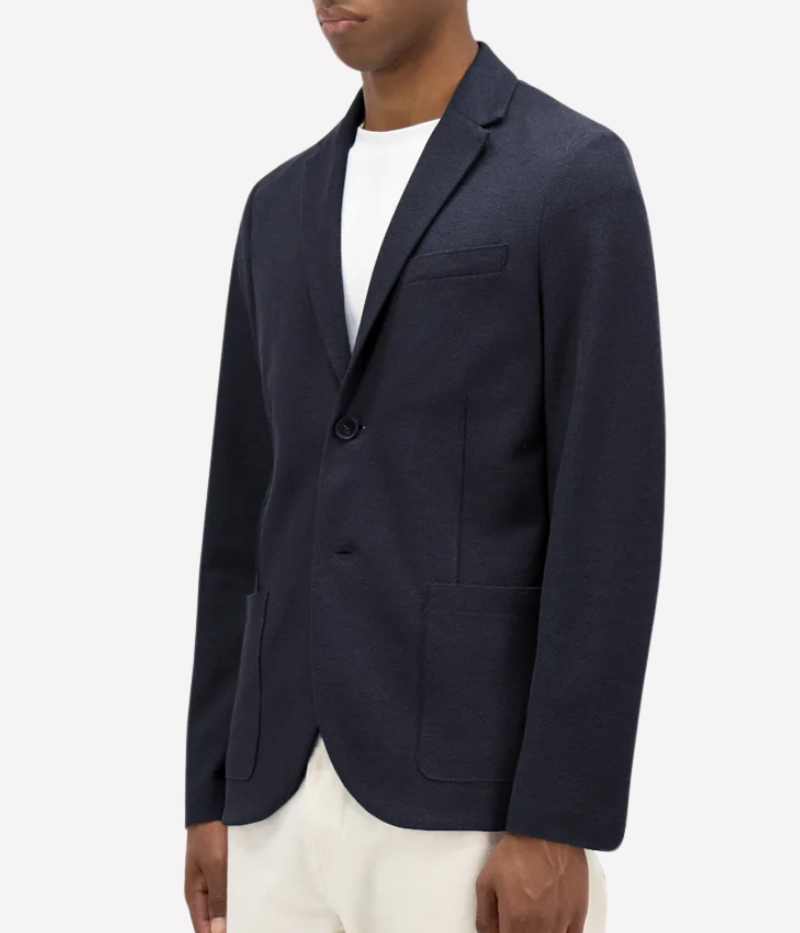 Men’s Loro Piana honeycomb-knit blazer with 2-button closure, notched collar, patch pockets, and unlined construction for lightweight layering. Made in Italy.