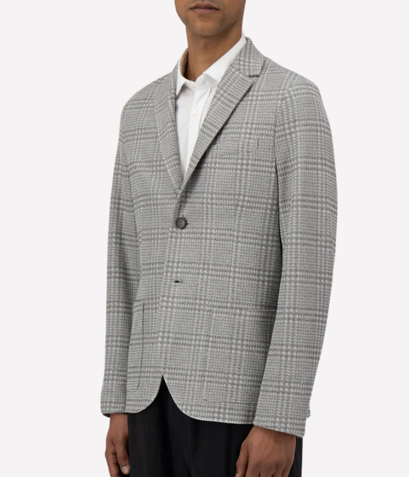 Men’s light grey check blazer in a knitted linen blend with notched lapels, 2-button closure, patch pockets, and an unlined structure for lightweight layering. Made in Italy.