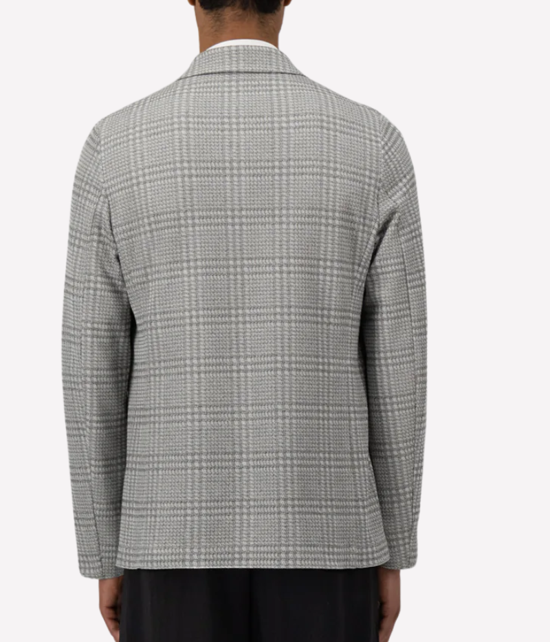 Men’s light grey check blazer in a knitted linen blend with notched lapels, 2-button closure, patch pockets, and an unlined structure for lightweight layering. Made in Italy.