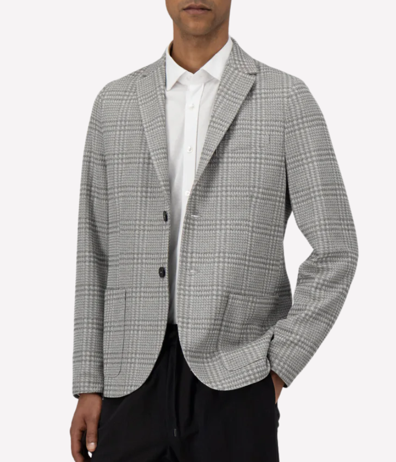 Men’s light grey check blazer in a knitted linen blend with notched lapels, 2-button closure, patch pockets, and an unlined structure for lightweight layering. Made in Italy.