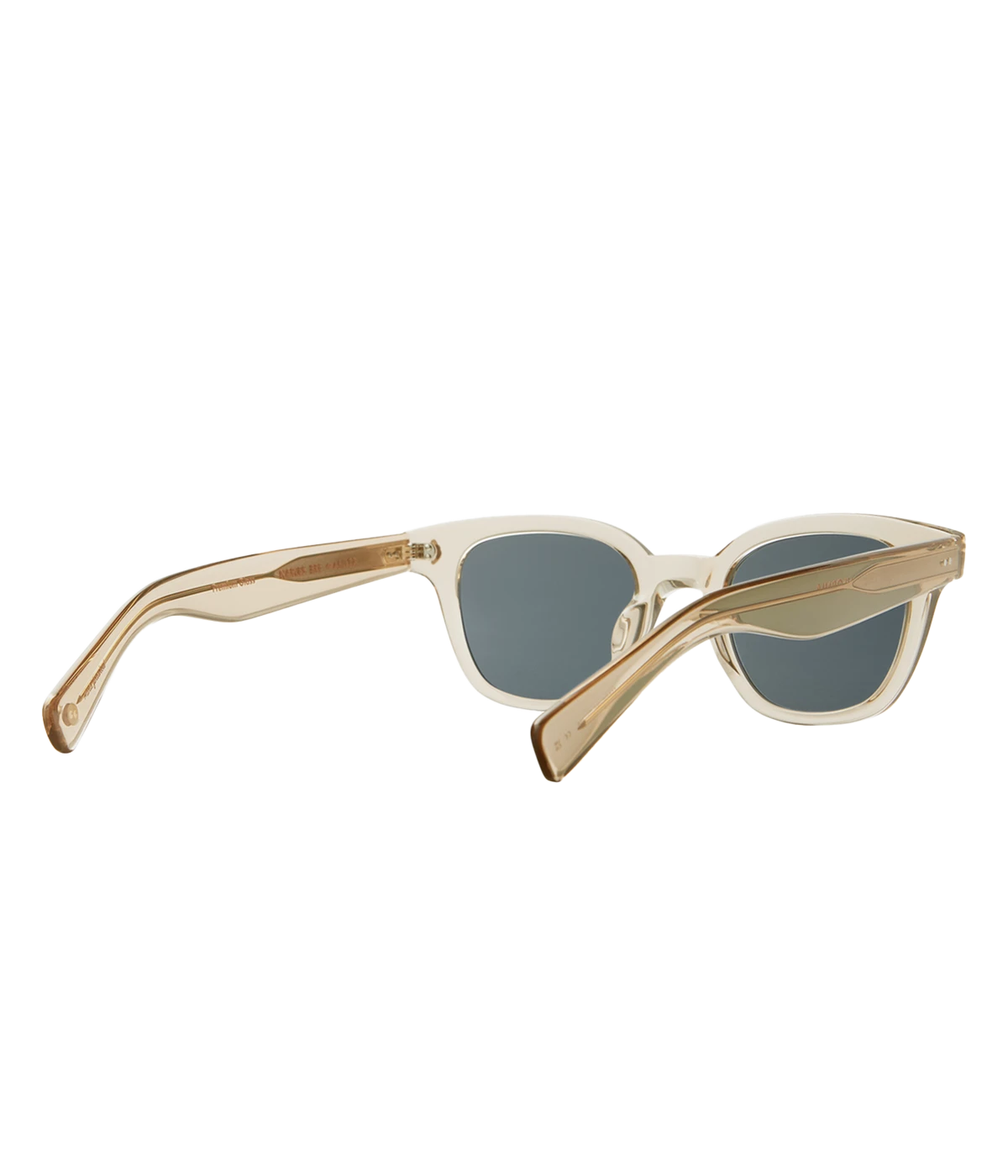 Cured cellulose acetate frame with stainless steel core wire and palm leaf plaques on exaggerated endpieces. Five barrel hinges with real rivets for a durable, stylish fit. Bold, vintage-inspired design.