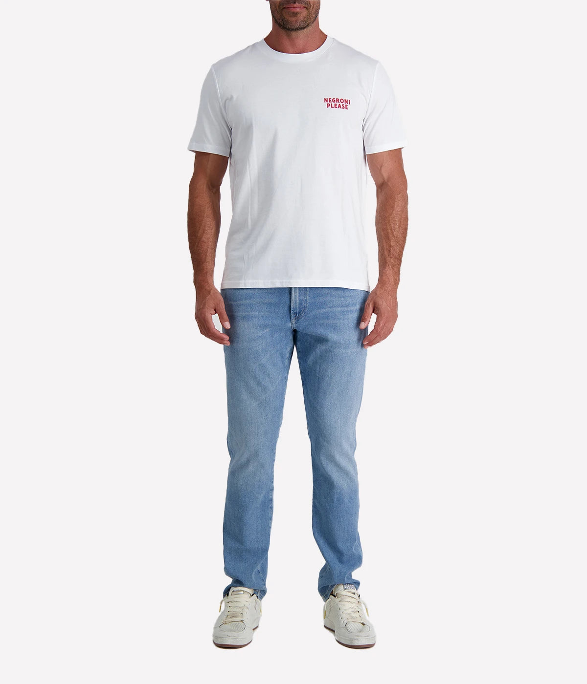 White graphic tee with "Negroni Please" text in red on the front and back, made from organic cotton.
