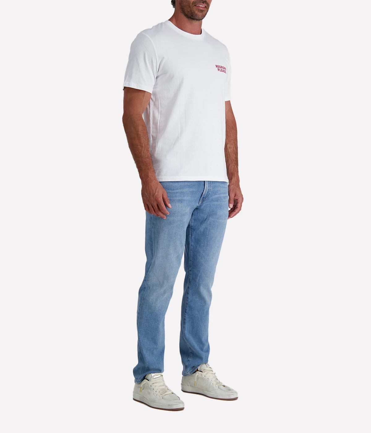 White graphic tee with "Negroni Please" text in red on the front and back, made from organic cotton.