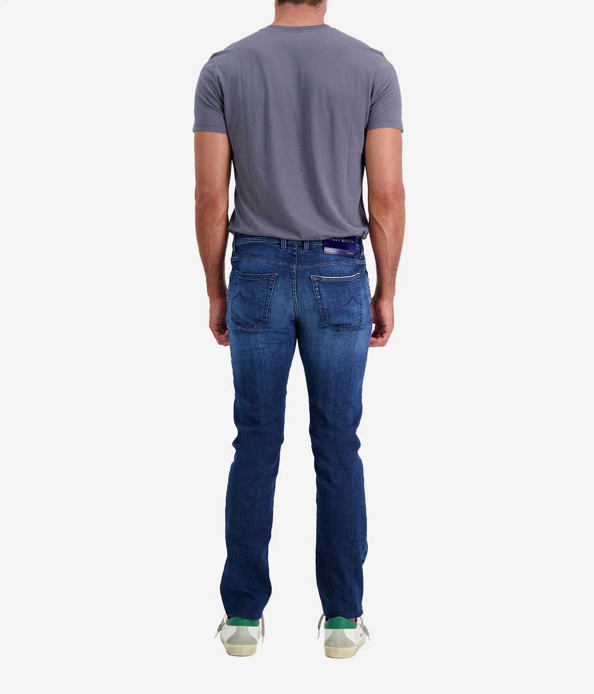 Back view of Jacob Cohen Nick 5-Pocket Jeans with a mid-rise waist, signature suede logo patch, and premium denim craftsmanship.