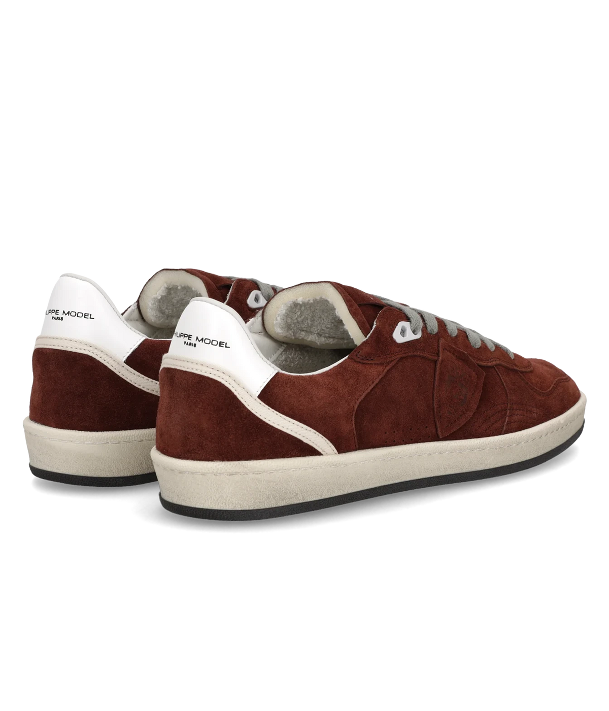 Rear three-quarter view of the Philippe Model Pgal Low Man in Daim Bordeaux pair, showing the white heel tabs and off-white cupsole