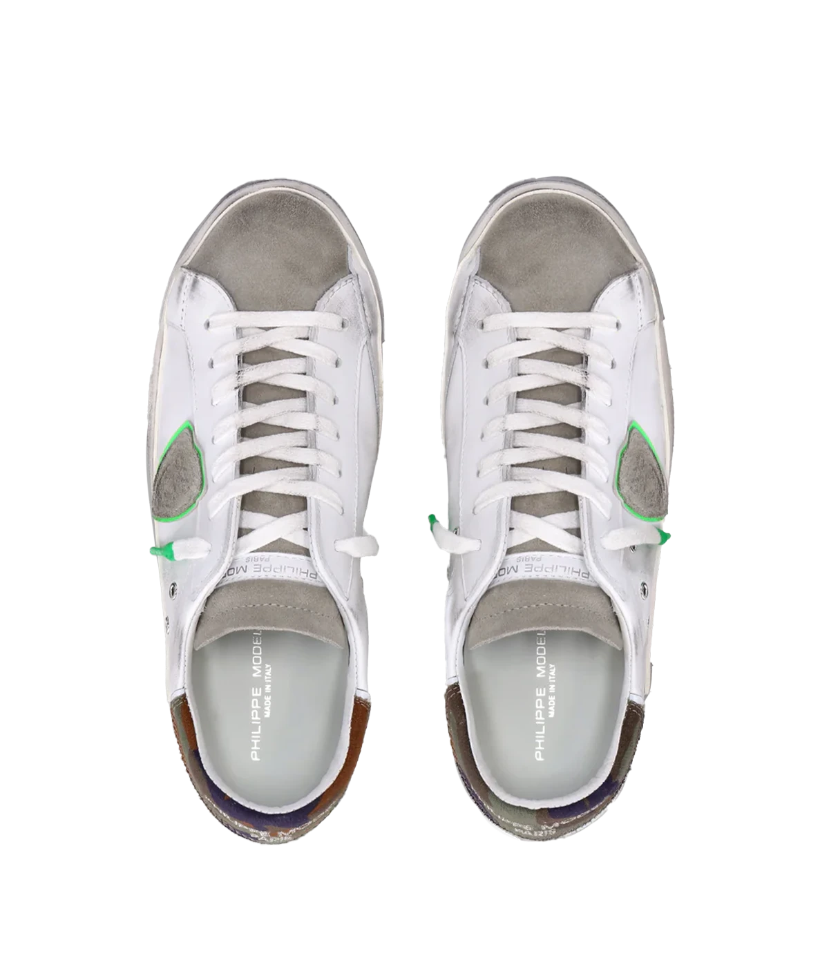 Top view of Philippe Model PRSX Low Man sneakers, highlighting the worn-effect white screen-printed laces and the vintage-used effect on the calfskin and suede upper. The 2.5 cm high brushed rubber sole with a vintage effect is visible.