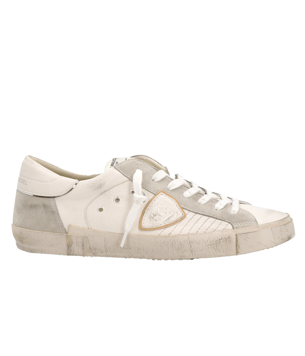 The PRSX sneaker in all-white puts a modern spin on ‘80s skate style with a worn-effect leather and suede upper, handcrafted rubber sole, and street-inspired details.