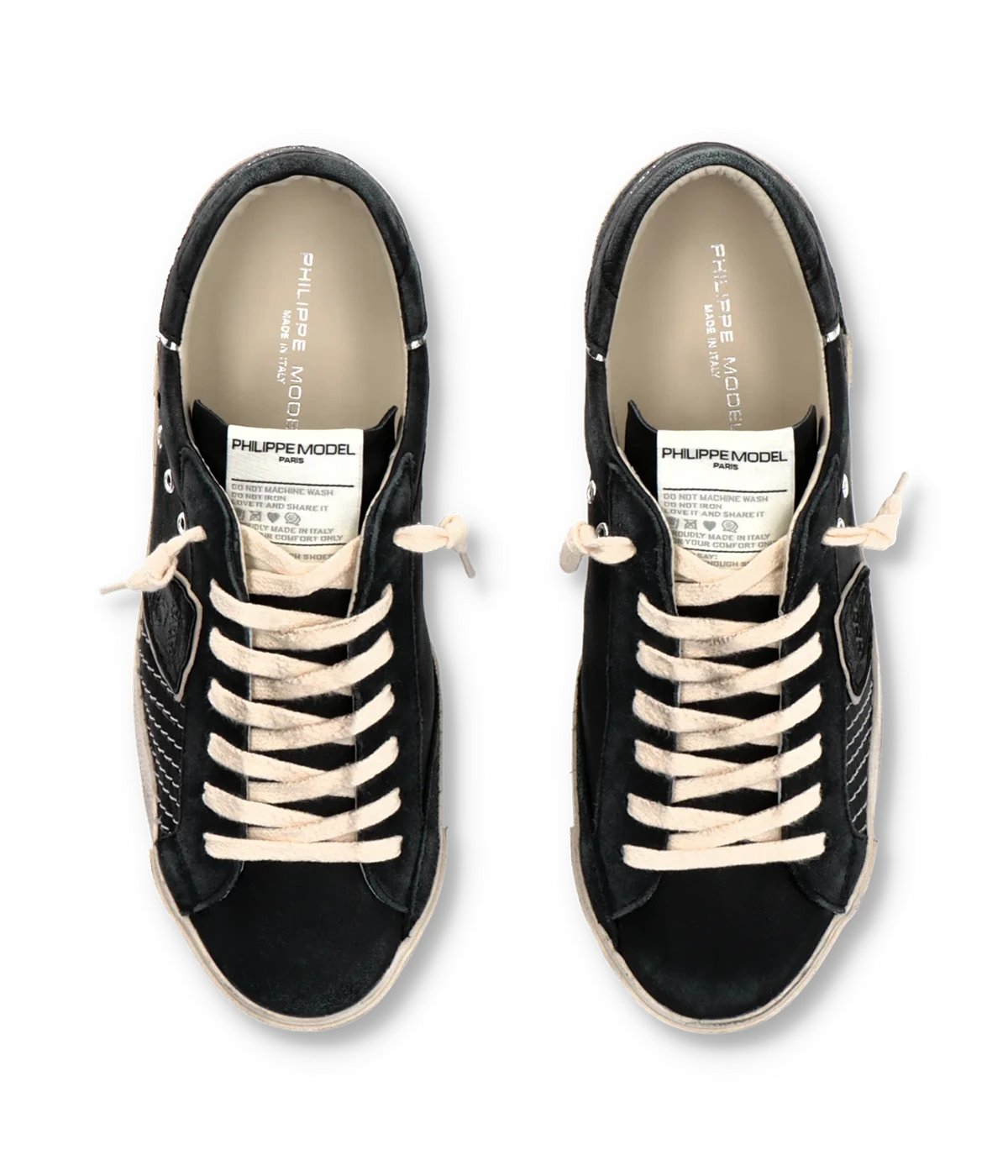 The PRSX sneaker blends ‘80s street style with French Riviera elegance, featuring a black suede and leather upper with contrast stitching, a handcrafted worn-effect sole, and premium comfort details.