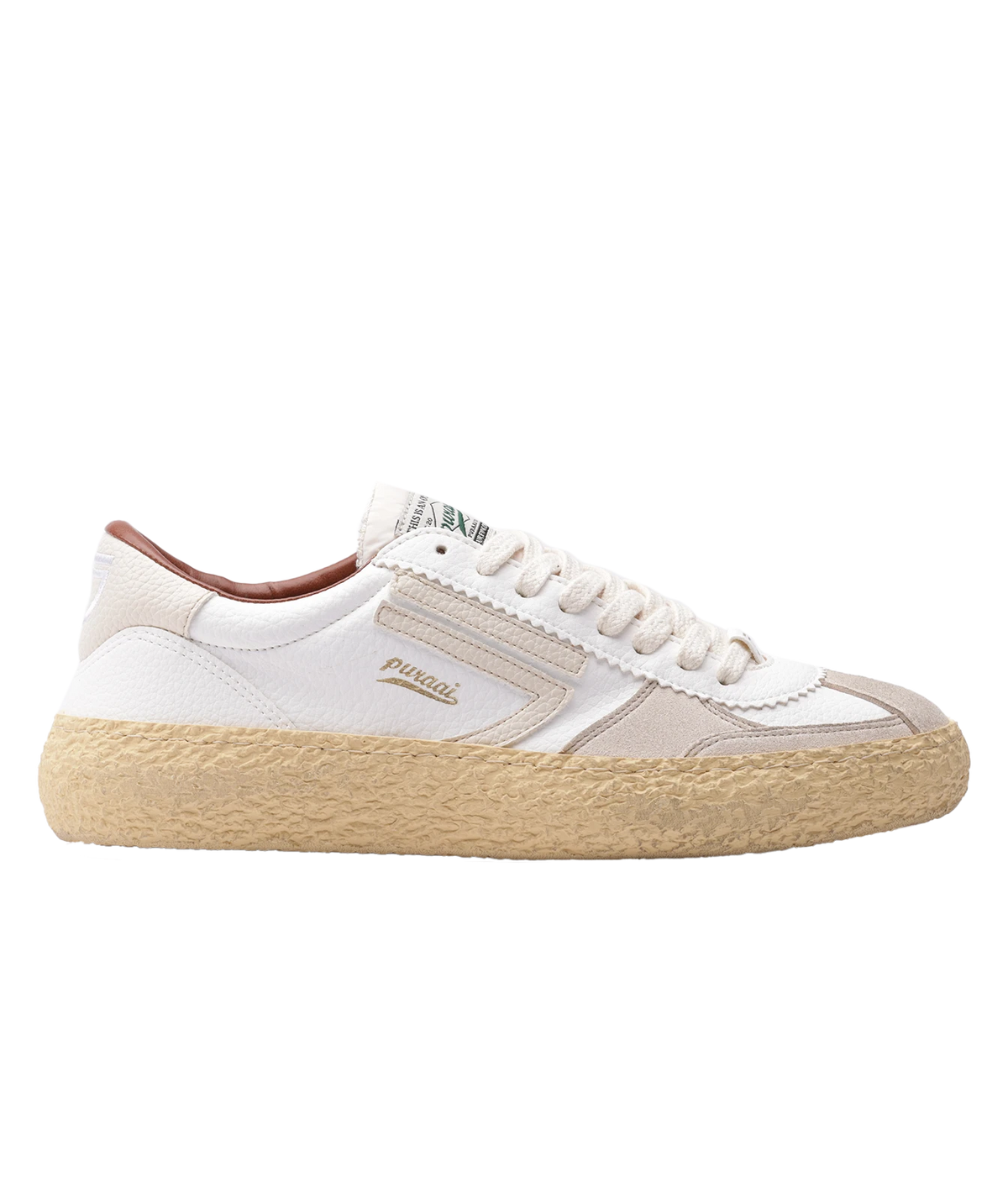 A low-top sneaker by Puraai featuring white panels, beige overlays, a beige jute-wrapped midsole, and a brown heel tab, shown against a plain white background.