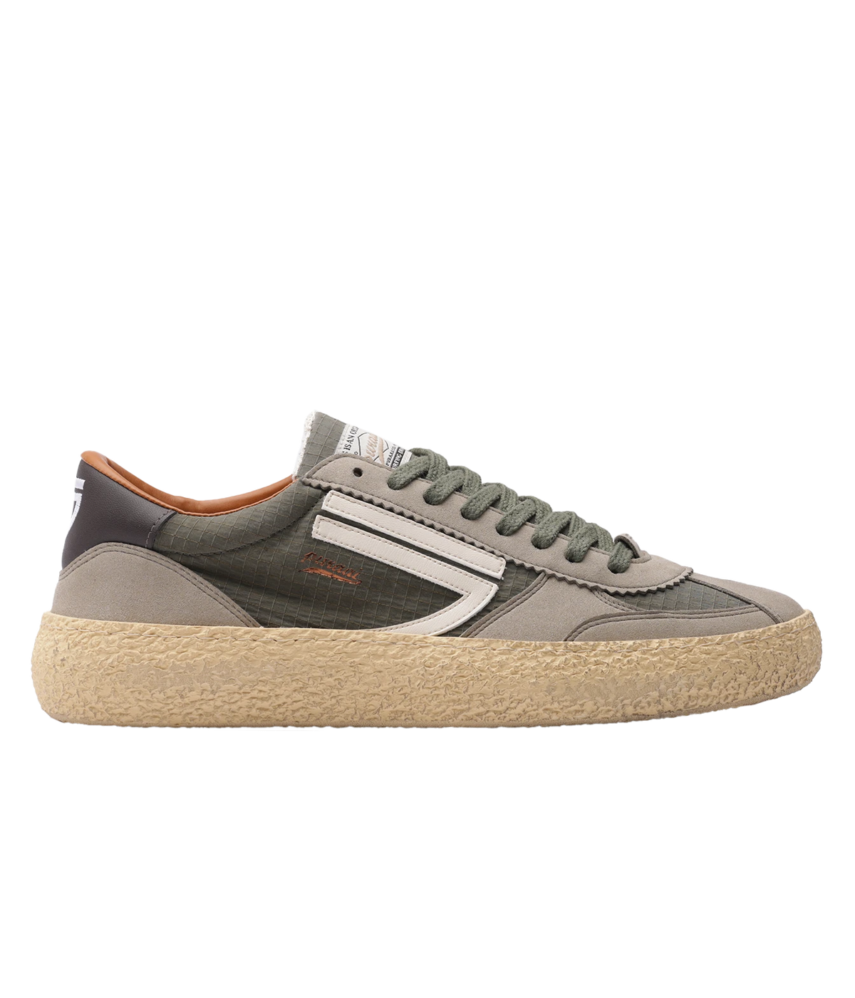 A low-top sneaker in muted grey and olive green, featuring a thick beige textured rubber sole and a white side stripe detail.