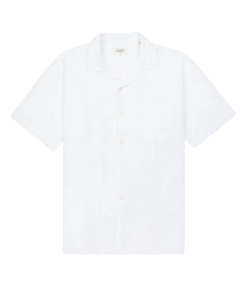 Men’s short-sleeve textured white cotton shirt with camp collar and chest pocket, designed in a regular fit for breathable, casual summer style.