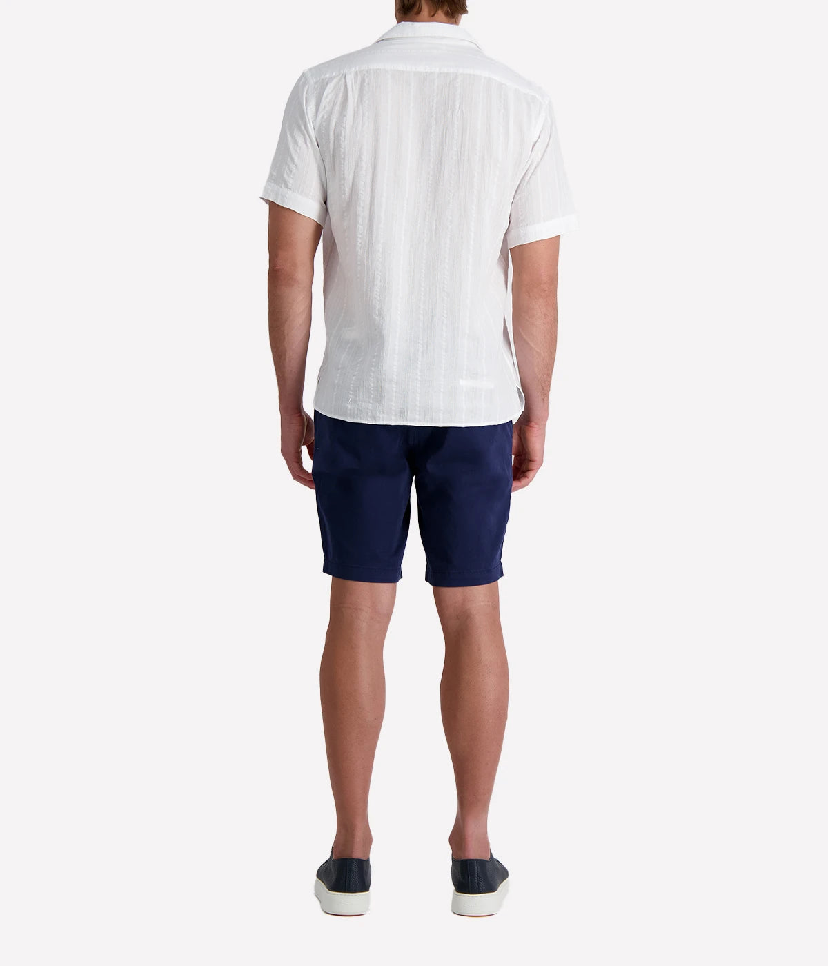 Men’s short-sleeve textured white cotton shirt with camp collar and chest pocket, designed in a regular fit for breathable, casual summer style.