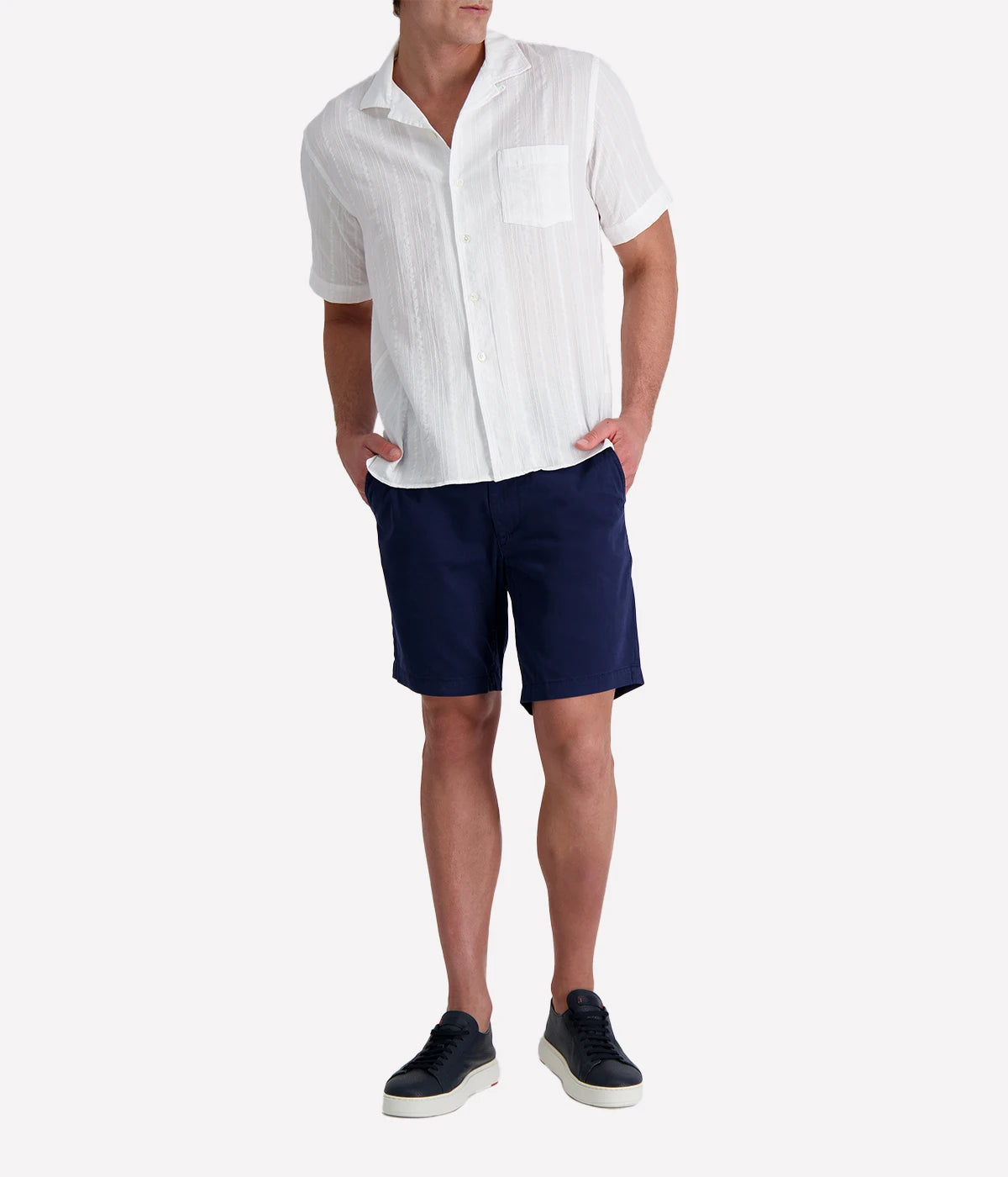 Men’s short-sleeve textured white cotton shirt with camp collar and chest pocket, designed in a regular fit for breathable, casual summer style.