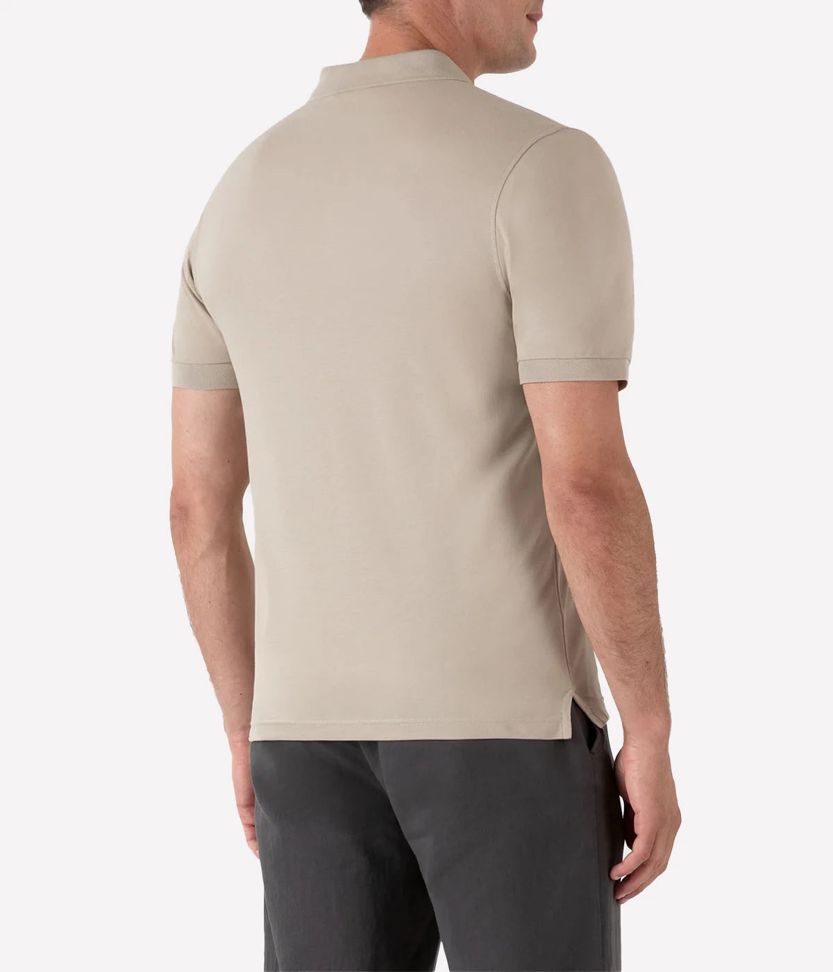 Ash grey piqué polo shirt for men made from Supima cotton. Features ribbed collar, side vents, and branded shell buttons for a sophisticated finish.