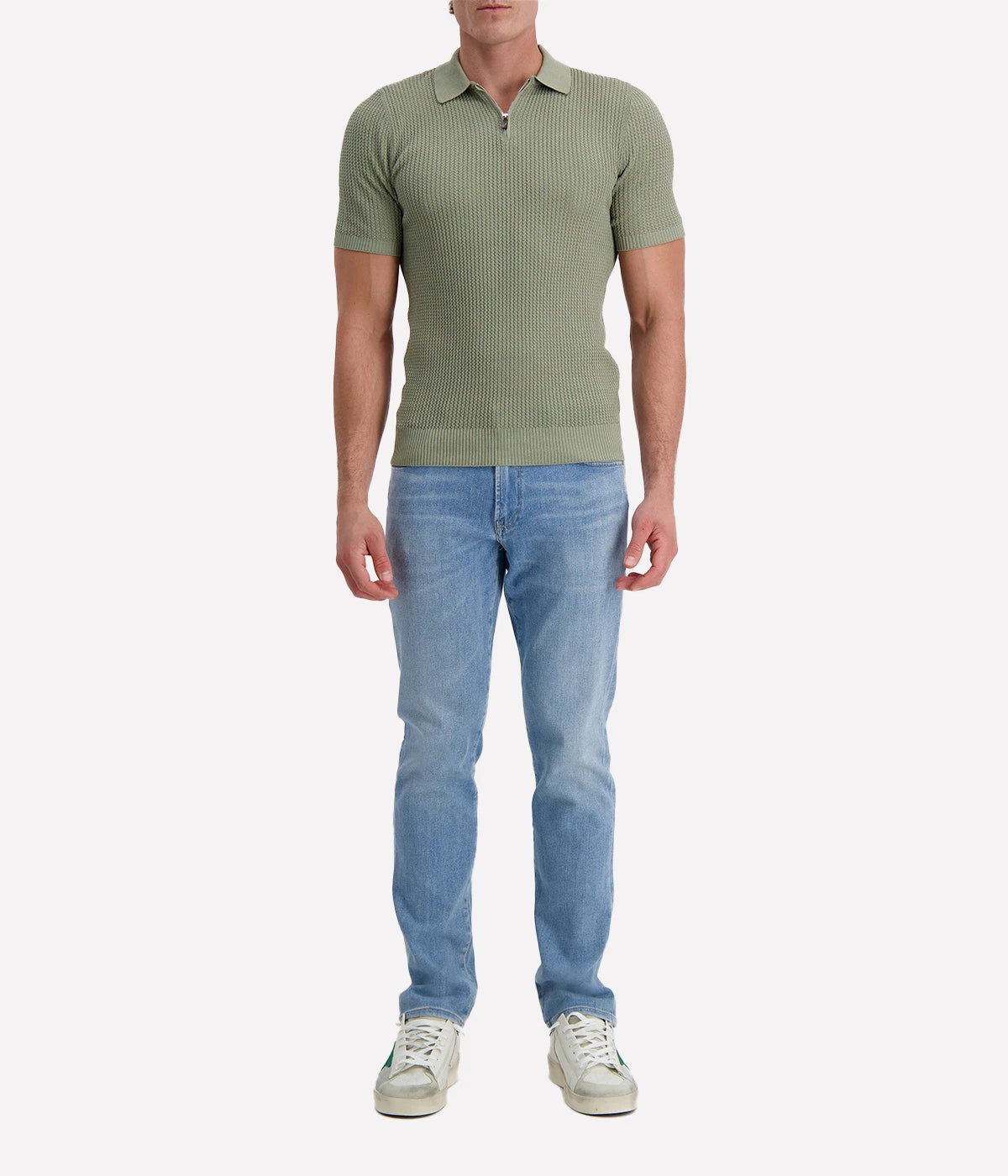 Eleventy sage green textured cotton polo shirt with short sleeves, half zip front, and ribbed trims, made in Italy.