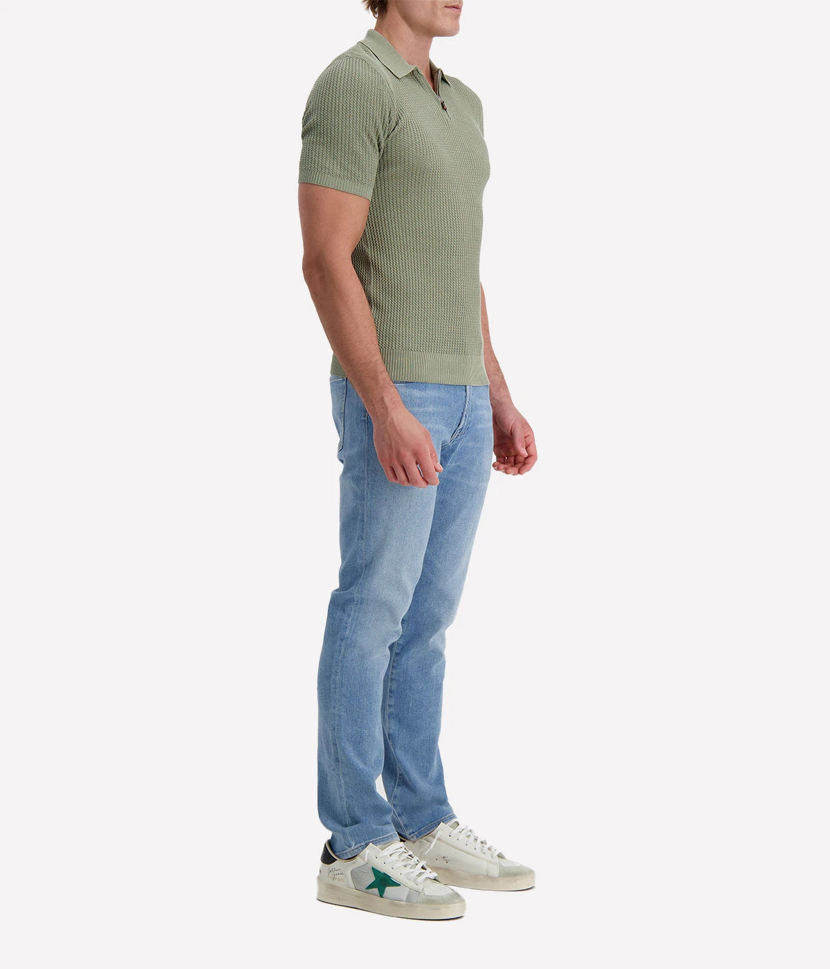 Eleventy sage green textured cotton polo shirt with short sleeves, half zip front, and ribbed trims, made in Italy.