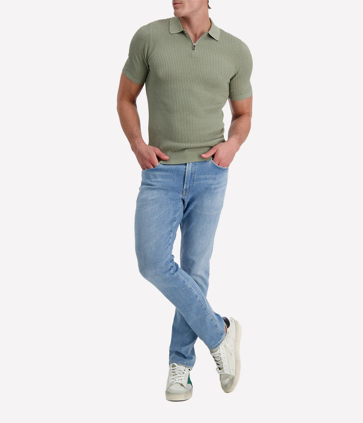 Eleventy sage green textured cotton polo shirt with short sleeves, half zip front, and ribbed trims, made in Italy.