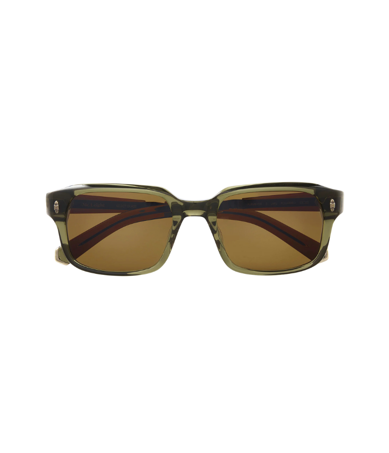 Close-up of Purveyor S sunglasses, featuring a bold, wide rectangular frame with sculpted, beveled design and custom titanium detailing.
