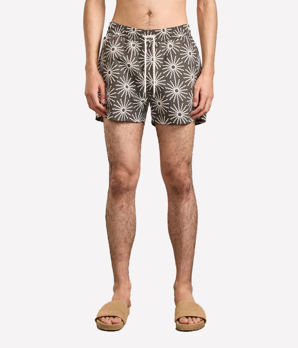 Rio Swim Shorts with sport fit, drawstring waist, branded cord-ends, 100% recycled polyester mesh lining, and back pocket with button-closure. Featuring bespoke O Sol motif.