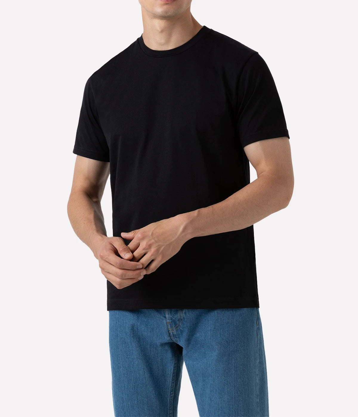 Front view of the Sunspel Riviera T-Shirt, originally designed for Daniel Craig in Casino Royale. Crafted from luxurious midweight cotton, the T-shirt features a classic crew neck and tailored fit, offering a smooth and durable feel perfect for transitional seasons.