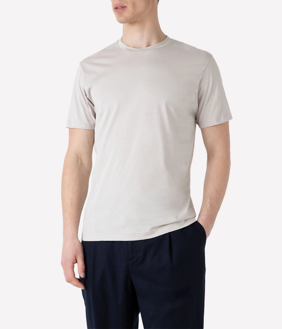 Front view of the Sunspel Riviera T-Shirt, originally designed for Daniel Craig in Casino Royale. Crafted from luxurious midweight cotton, the T-shirt features a classic crew neck and tailored fit, offering a smooth and durable feel perfect for transitional seasons.