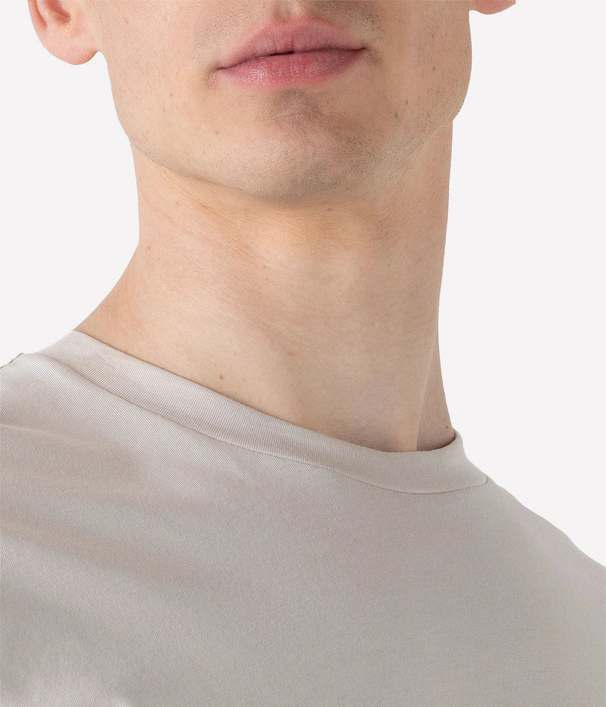Close-up of the Sunspel Riviera T-Shirt fabric, highlighting the luxurious midweight cotton. The smooth texture and slight extra weight make it durable and perfect for transitioning between seasons.