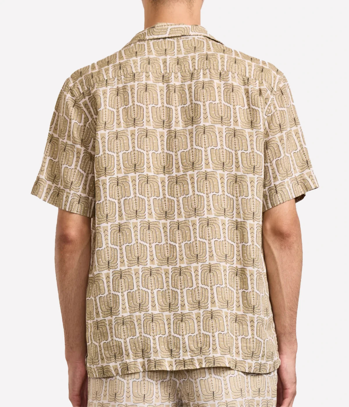 Roberto linen shirt with camp collar, imitation mother-of-pearl branded buttons, relaxed fit, and all-over custom Palmeira print inspired by Rio.