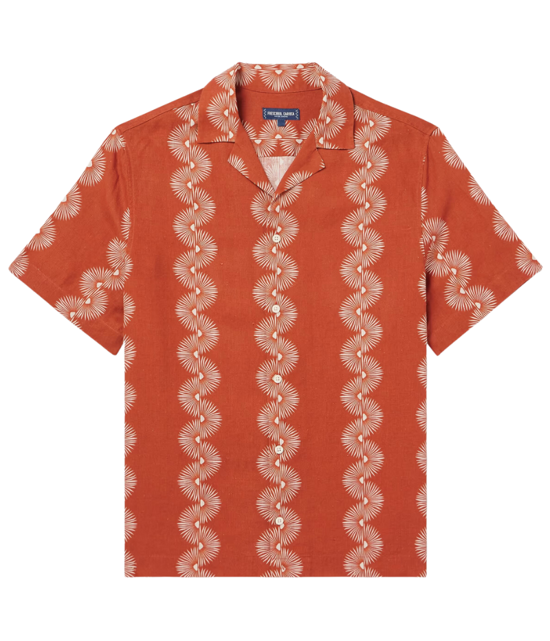 The Roberto Linen Short Sleeve Geo Shirt in Burnt Orange features a modern geometric pattern and lightweight linen fabric. With a relaxed fit and short sleeves, this shirt is perfect for warm weather, offering breathability and versatility for casual or dressier occasions. Style with tailored shorts or chinos for a refined summer look.
