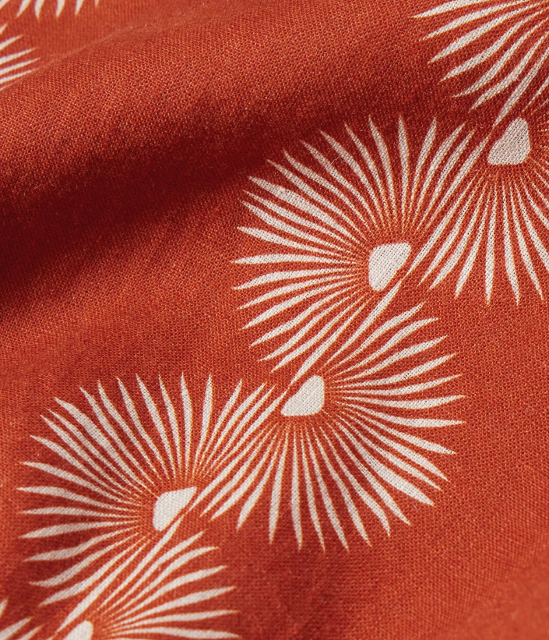 The Roberto Linen Short Sleeve Geo Shirt in Burnt Orange features a modern geometric pattern and lightweight linen fabric. With a relaxed fit and short sleeves, this shirt is perfect for warm weather, offering breathability and versatility for casual or dressier occasions. Style with tailored shorts or chinos for a refined summer look.