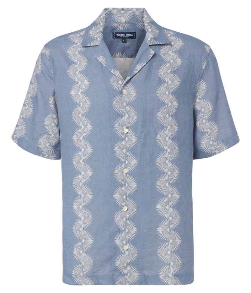 The Roberto Linen Short Sleeve Geo Shirt in Denim Blue features a modern geometric pattern and lightweight linen fabric. With a relaxed fit and short sleeves, this shirt is perfect for warm weather, offering breathability and versatility for casual or dressier occasions.