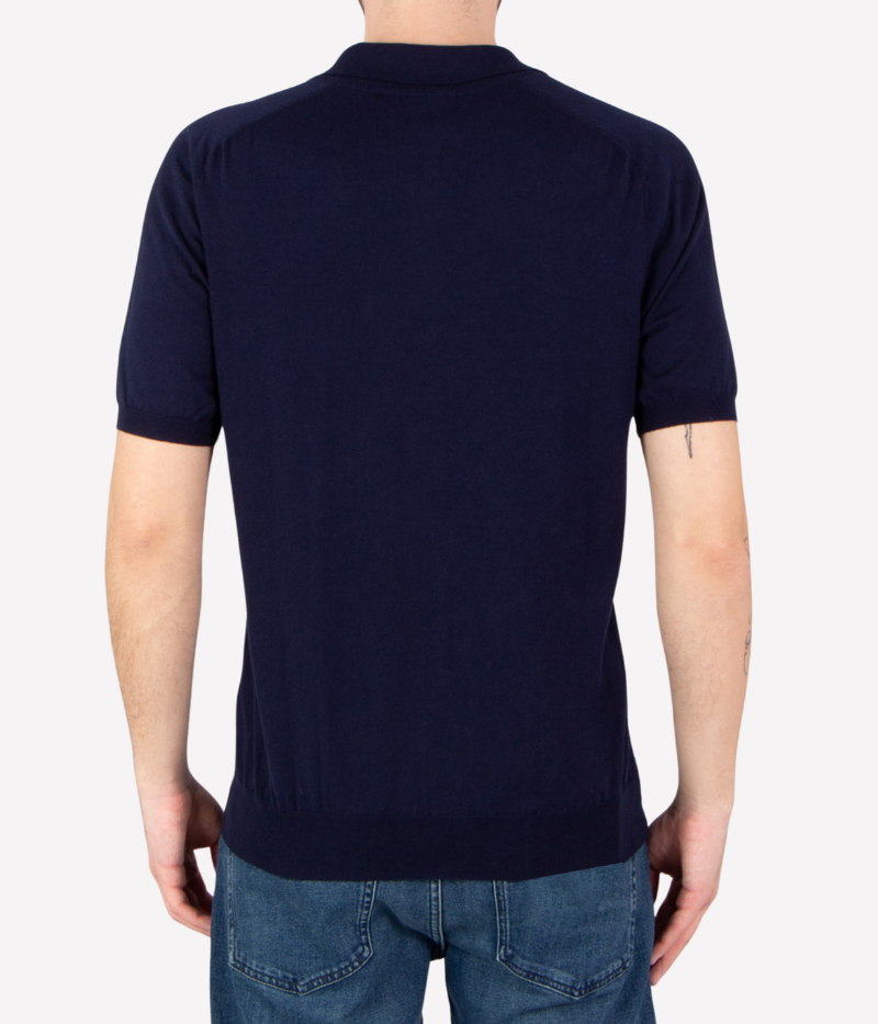 Navy pointelle-knit polo shirt with button placket, short sleeves, and ribbed trims, crafted from breathable cotton.