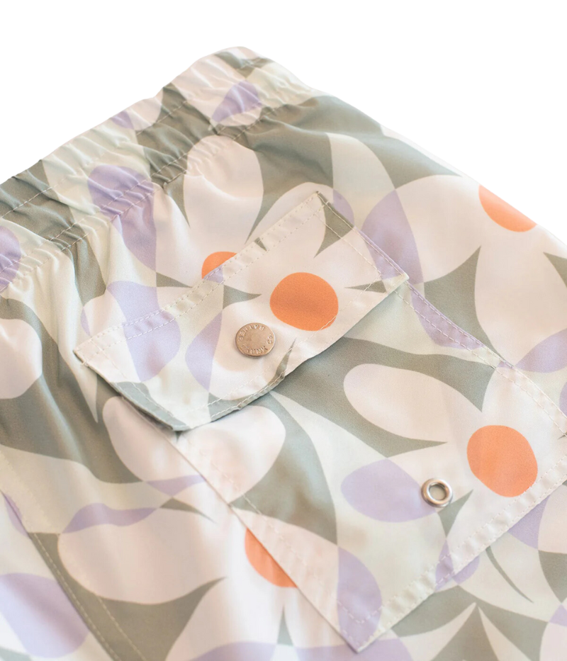 A playful statement for your swim style, the Bather Sage Daisy Trip Swim Trunk features a charming pattern of painted daisies in a calming sage hue. Designed for both fun and function, these trunks bring a laid-back vibe to any beach day or poolside hangout. Made for comfort and style, they’re perfect for making a splash, no matter where your adventures take you.