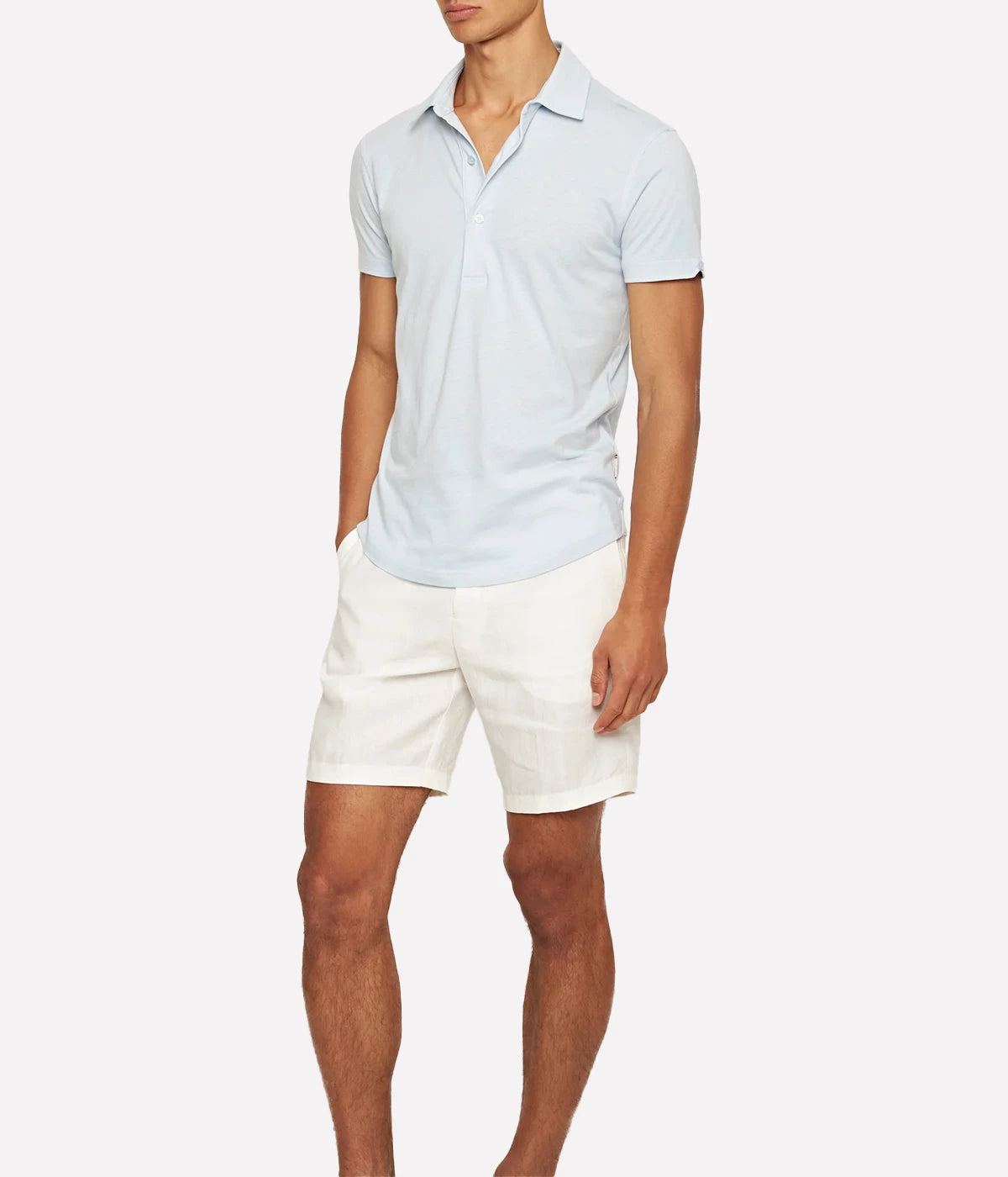 Men’s tailored cotton-silk polo shirt with structured collar, buttoned cuffs, and three-button placket, designed for a smooth, breathable feel in a smart silhouette