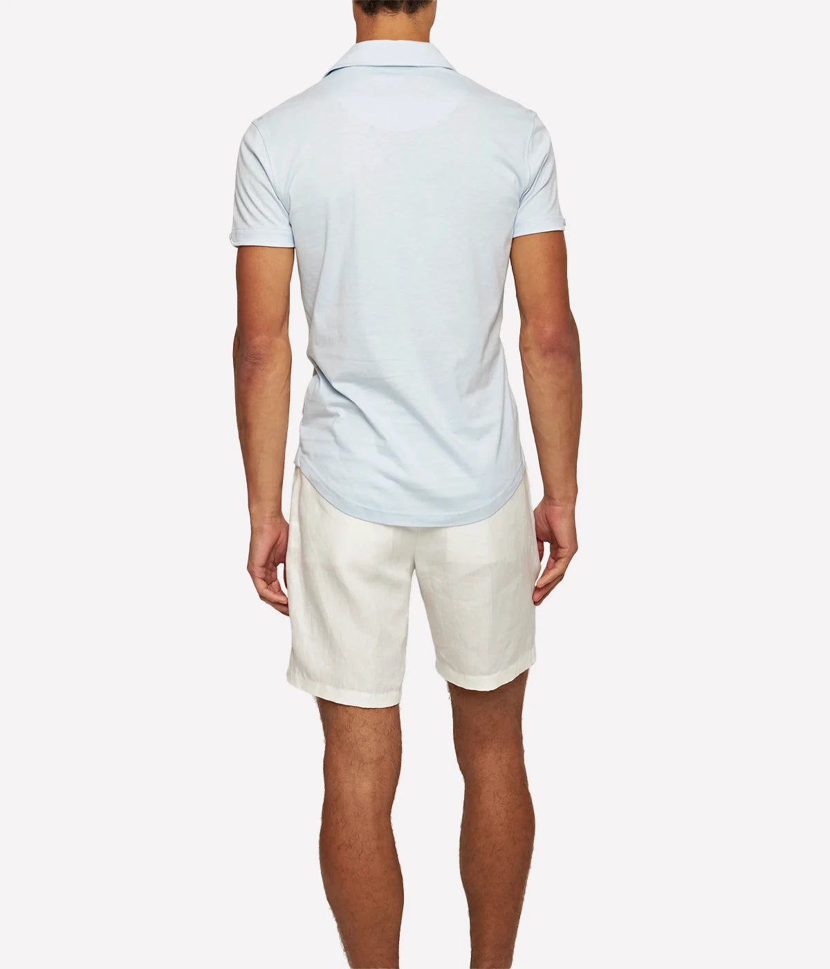Men’s tailored cotton-silk polo shirt with structured collar, buttoned cuffs, and three-button placket, designed for a smooth, breathable feel in a smart silhouette