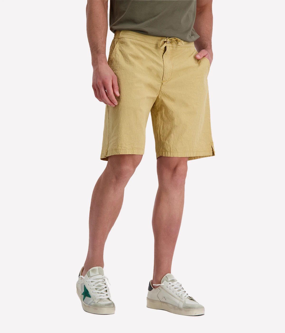 Men’s garment-dyed yellow Sergio Shorts with drawstring waist, made from soft Supima cotton with stretch for a relaxed yet refined fit.
