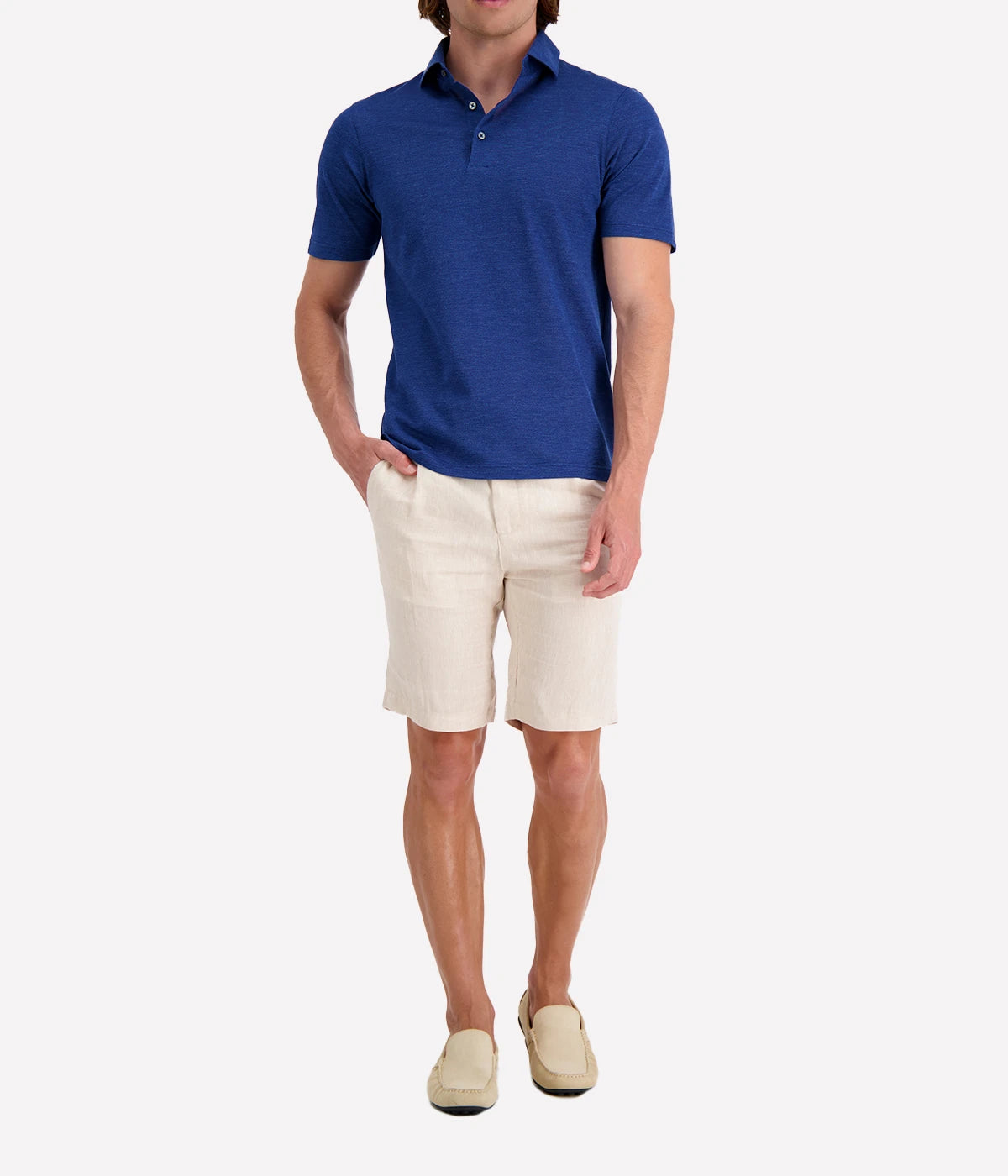 Model wearing the Gran Sasso Marine Blue Polo Shirt, styled with tailored shorts and loafers for a polished smart-casual look. A versatile Italian men’s shirt for any occasion.