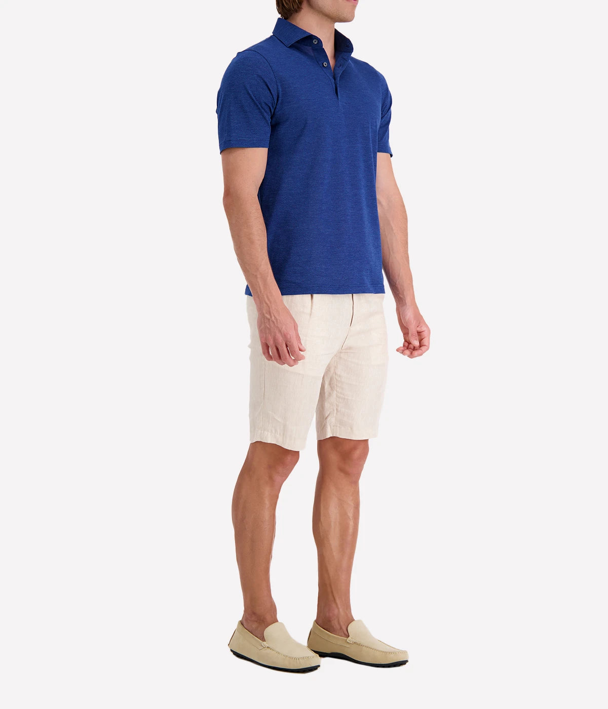 Side profile of the Gran Sasso Marine Blue Polo Shirt, highlighting its lightweight cotton construction and relaxed, stylish fit. Perfect for year-round wear.