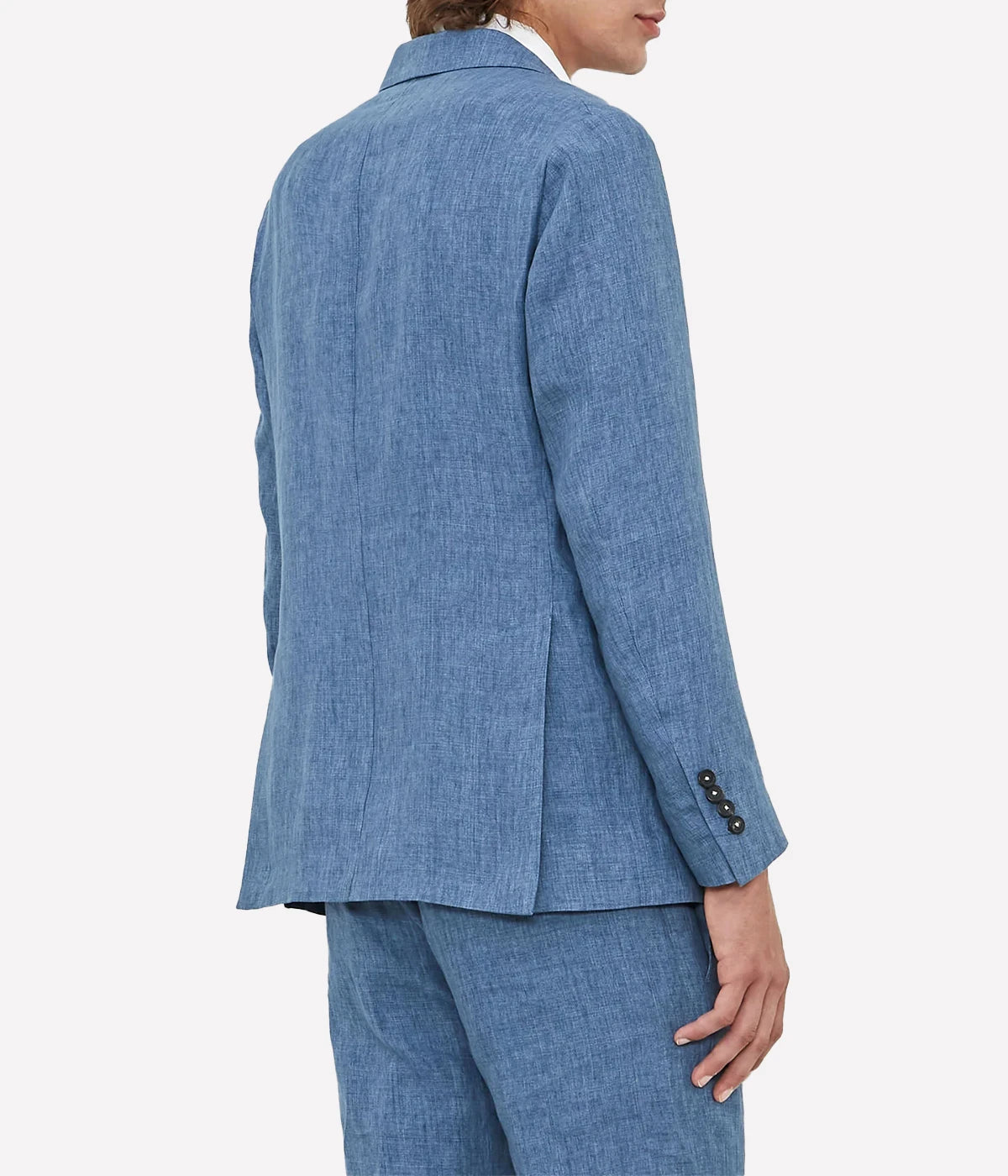 Men's casual deconstructed linen suit with a three-button jacket and slim-fit trousers.